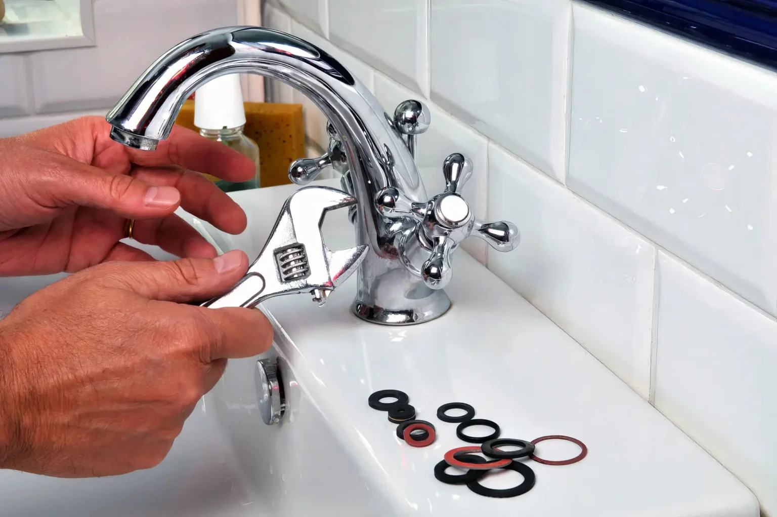 Plumber maintaining a bathroom faucet in Carson